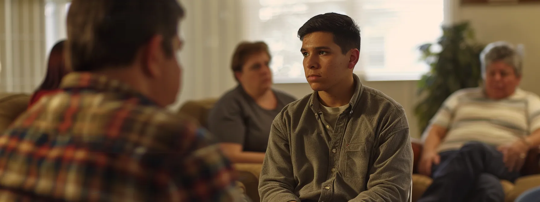 a person attending an outpatient drug treatment program, engaging in a group therapy session surrounded by a diverse and supportive community.