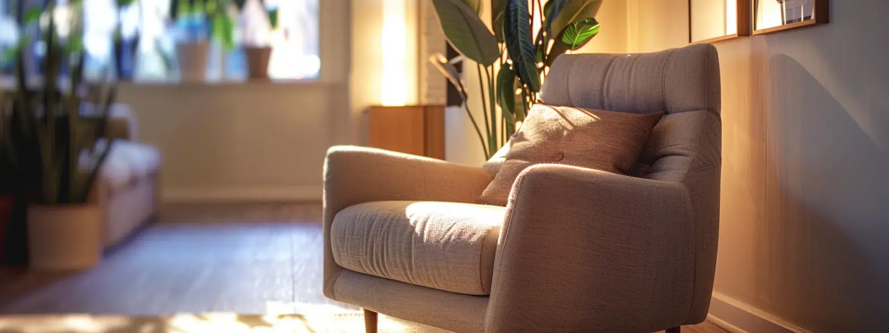 a calm and inviting therapy office, featuring a plush armchair and soft ambient lighting, emphasizes the importance of mental health services by showcasing a serene environment conducive to emotional healing and support.