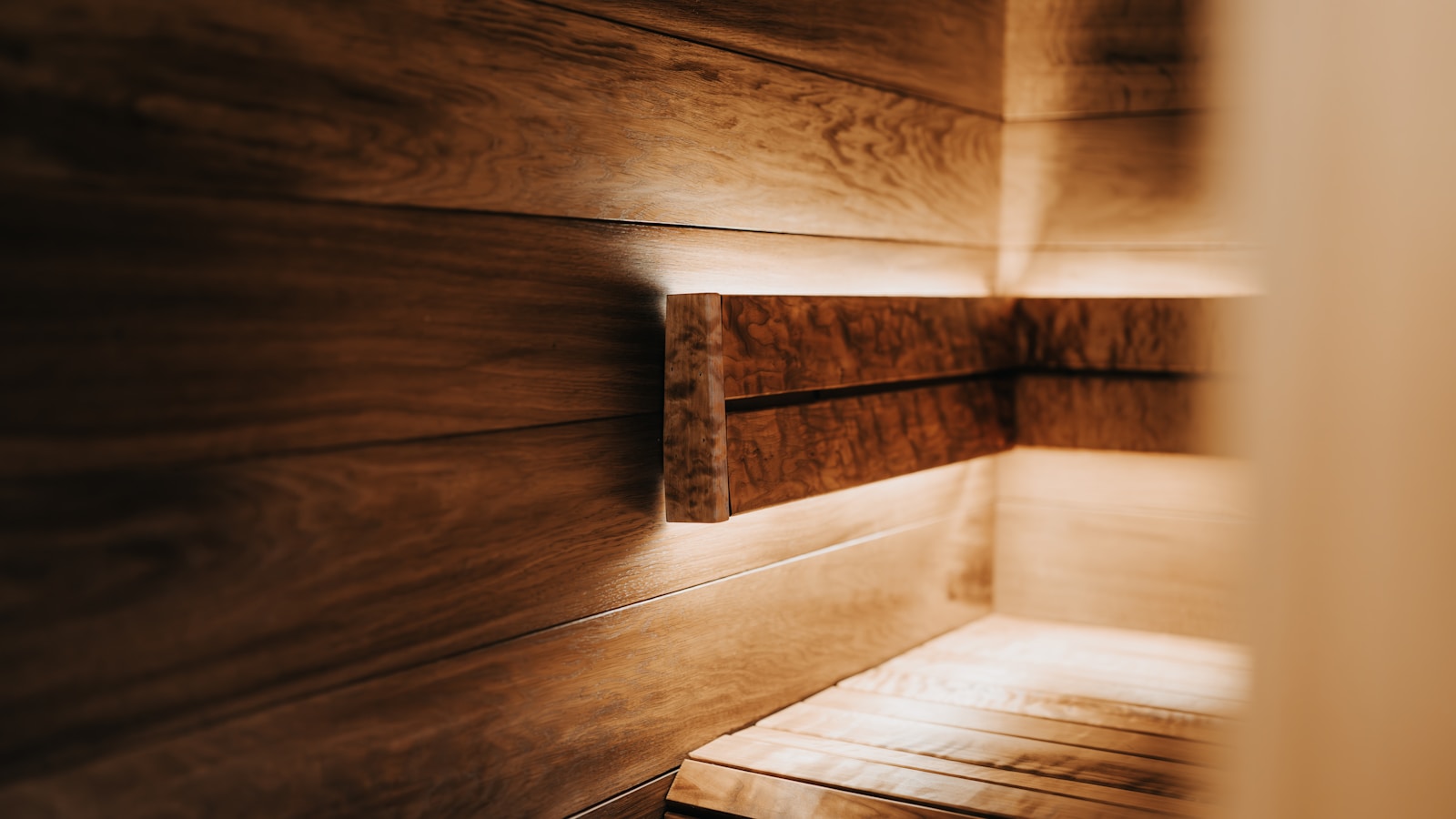 A warm wooden interior with subtle natural light, a quiet therapy room