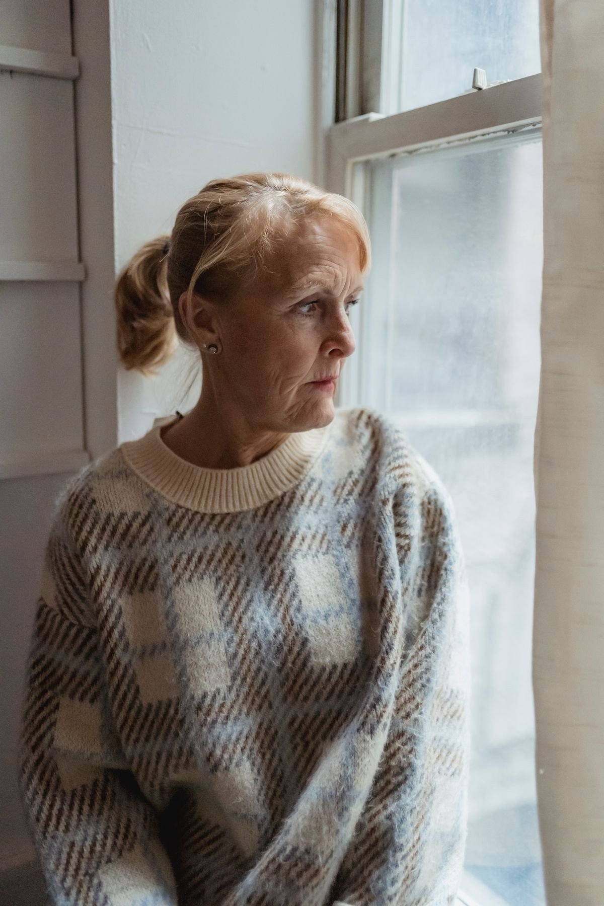 Adult reflecting during a therapy session