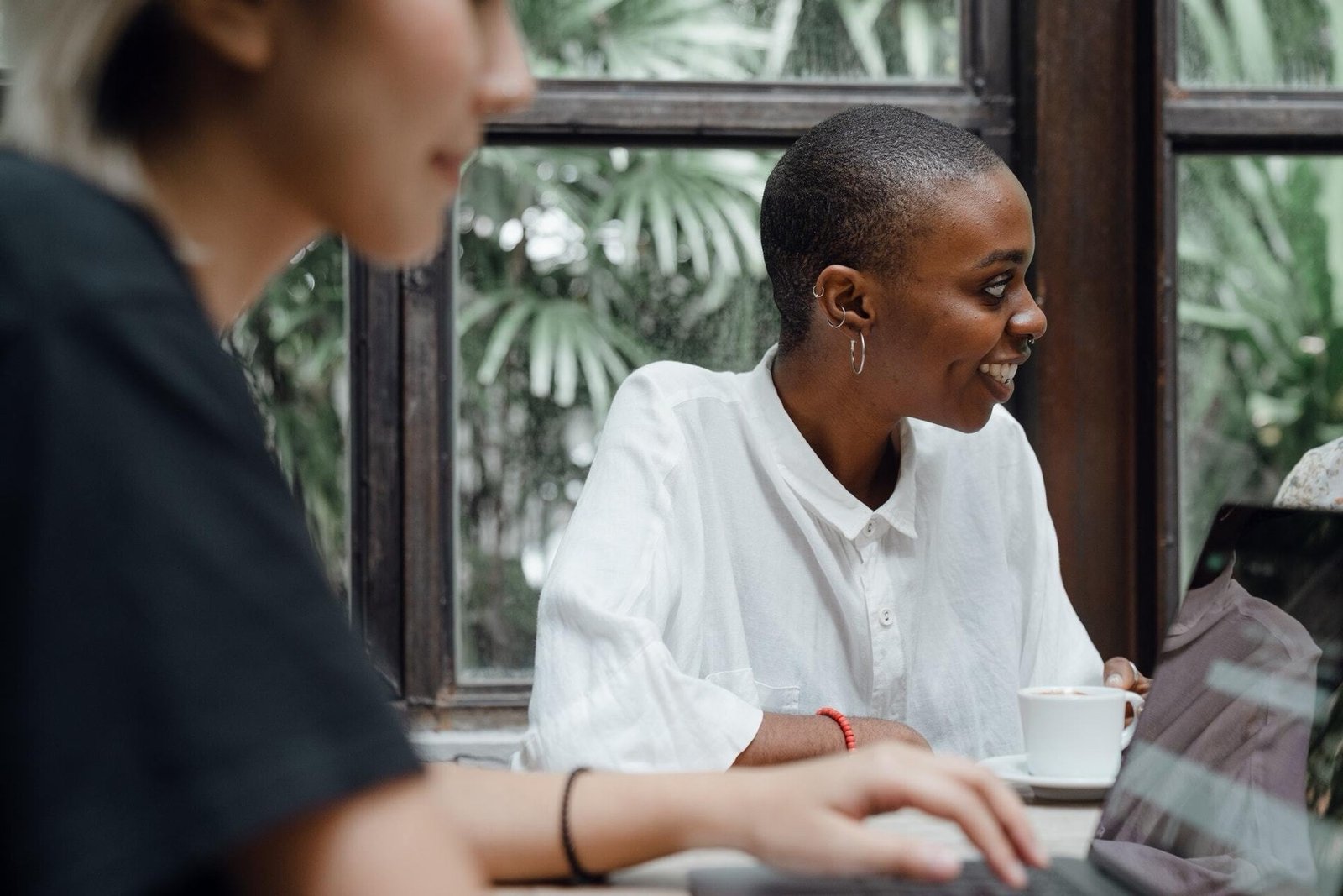Personalized Mental Health Virtual IOP | Thrive Florida 10 LGBTQ+ adult in a virtual therapy session at home