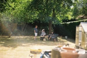 Virtual IOP in San Diego, California 2 Three children relaxing in a sunny backyard.