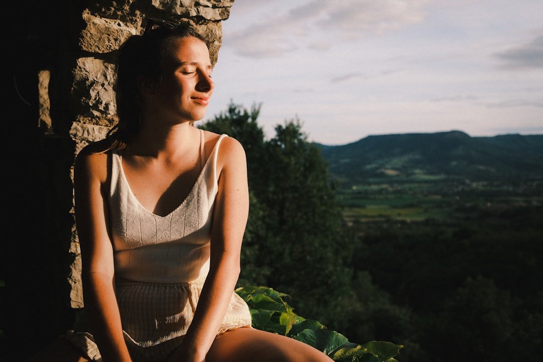 Girl enjoying golden hour light in France.