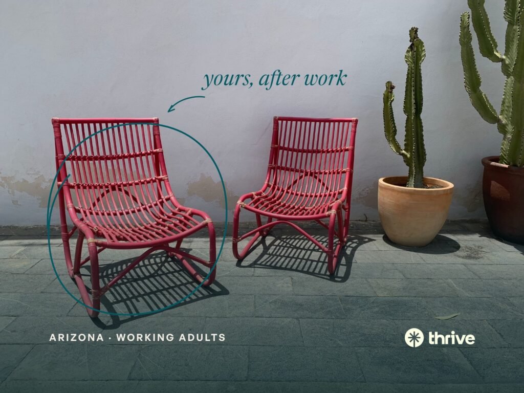 Yours, after work. Two red chairs beside a cactus against a white wall. Thrive.