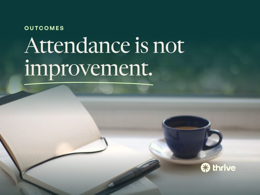 Attendance is not improvement. An open notebook and a cup of coffee by a sunny window. Thrive.