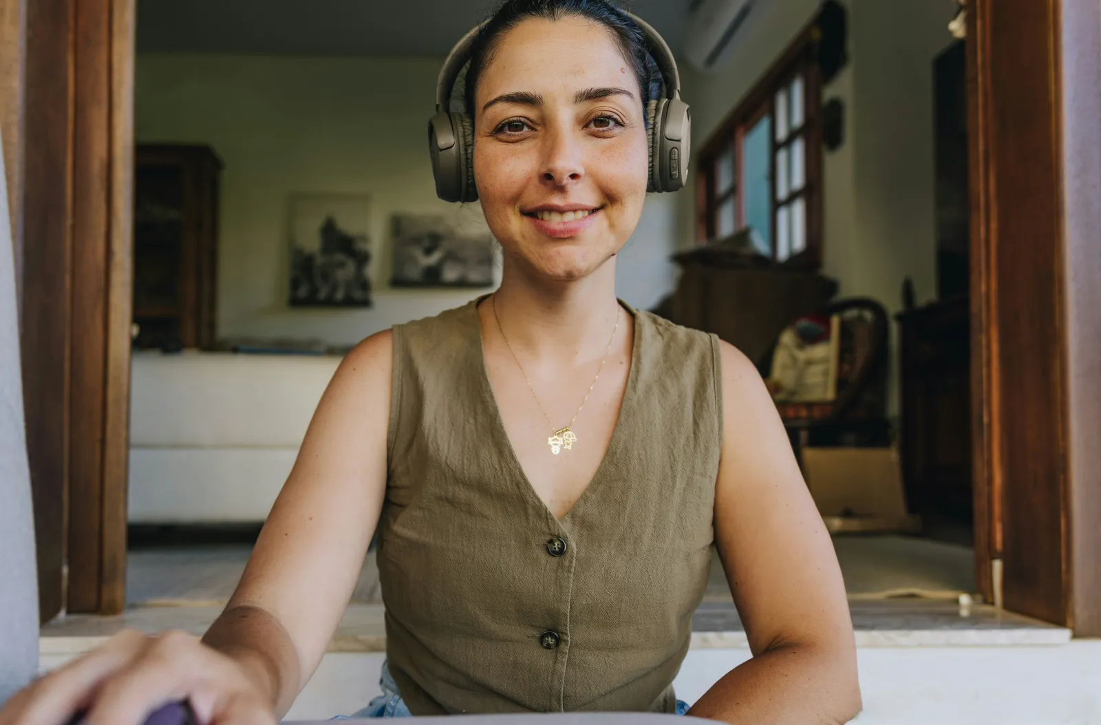 Therapist smiling on a video session from home