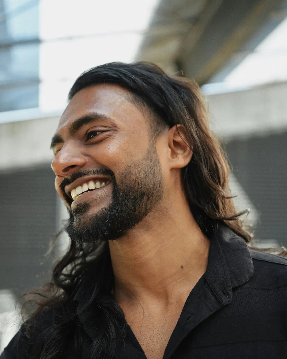 Man smiling outdoors